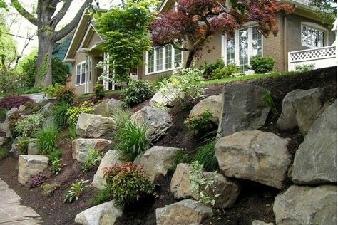 rock garden retaining wall, via precision landscape. Boulder Wall Landscaping, Boulder Outcropping, Rock Retaining Wall, Garden Retaining Wall, Rock Walls, Stone Landscaping, Sloped Backyard, Landscaping With Boulders, Landscaping Retaining Walls