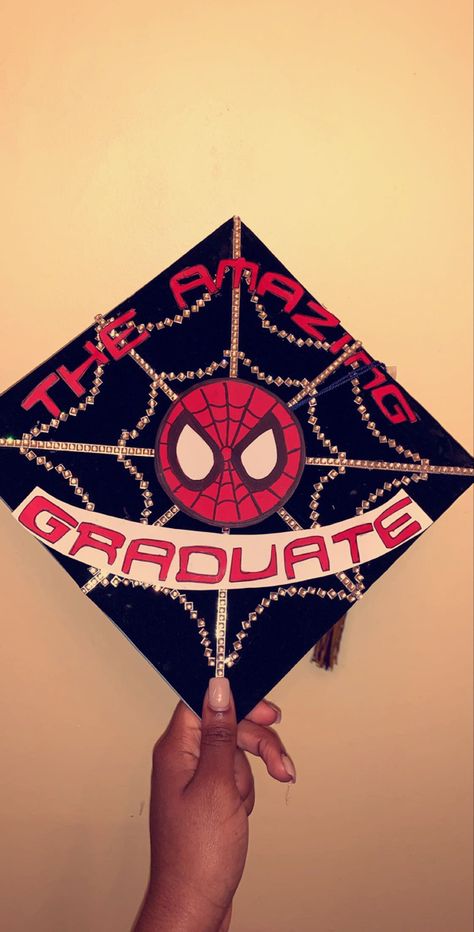 marvel spiderman grad cap Ghostface Graduation Cap, Spiderman Senior Parking Spot, High School Graduation Cap Designs Ideas, Cap Decoration Graduation Spiderman, Spider Man Cap Graduation, Miles Morales Graduation Cap, Horror Movie Graduation Cap, Spiderman Graduation Cap Ideas, Graduation Cap Designs Men