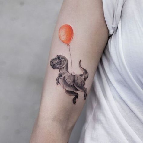 Small Dinosaur tattoo. Dinosaur Tattoo Ideas, Hase Tattoos, T Rex Tattoo, Dinosaur Tattoo, Master Tattoo, Balloon Tattoo, Model Tattoo, Rainbow Tattoos, Dinosaur Tattoos