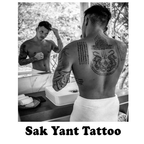 What are Sak Yant Tattoos? | Designs, Meanings, History 2023 Sak Yant Back Tattoo, Tato Irezumi, Man With Tattoos, Tato Suku, Tato Dada, Buddhist Tattoo, Tattoo Placements, Thailand Tattoo, Bamboo Tattoo