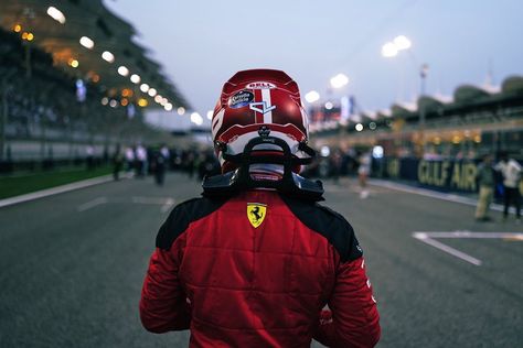 Back of Charles Leclerc of Scuderia Ferrari in his helmet and race suit on the grid. Wallpaper Formula 1, Belgium Grand Prix, Escuderias F1, Bahrain Grand Prix, Canadian Grand Prix, Mclaren Formula 1, Australian Grand Prix, F1 Wallpaper Hd, Formula 1 Car Racing