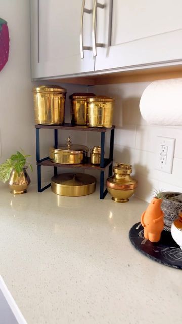 Chandana on Instagram: "Spices refills and organization - if all that could happen in 30 secs 😄 . . . . . . . . . . . . . #indianspices #spicerack #brasscontainers #brassmasalabox #kitchen #kitchendecor #kitchendesign #indiankitchen #indiankitchendecor #kitchengoals #kitchenideas #kitcheninterior #ａｅｓｔｈｅｔｉｃ #homeorganization #kitchenorganization #pantry" Indian Spice Organization Ideas, Indian Spice Organization, Indian Kitchen Organization Ideas, Indian Kitchen Decor, Kitchen Pantry Design, Indian Kitchen, Kitchen Spices, Spice Organization, Pantry Design