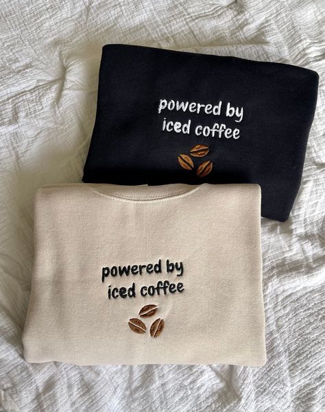 Made to order embroidered powered by iced coffee sweatshirt! Perfect gift for your fave iced coffee lover! Sizes are UNISEX Shirts are JERZEEs, Gildan, Fruit of the Loom brand **Machine wash COLD and hang dry to extend embroidery life** Sweatshirts are made to order so processing time is 3-7 business days. Please message me if you need your order sooner, and I will do everything I can to get it to you ASAP! Message me for any custom orders! Coffee Shirts Ideas, Cricket Sweatshirt Ideas, Cricut Sweaters, Embroidered Clothes Ideas, Machine Embroidery Inspiration, Coffee Lover Gift Ideas, Sweatshirts Ideas, Coffee Clothes, Coffee Merch