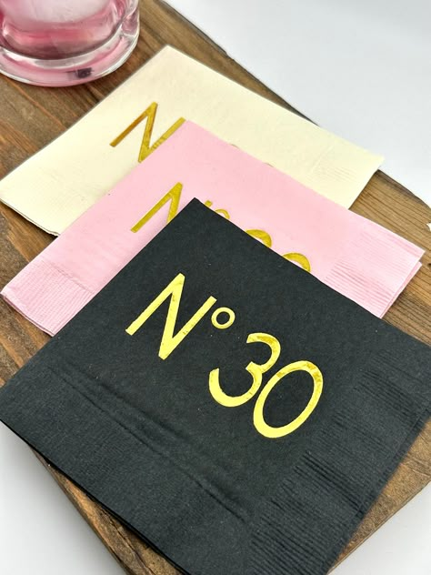 No 30 Couture Themed 30th Birthday cocktail napkins.    The napkins are 5 X 5 in, 3 ply.  They make great decorations for a 30th Birthday party.  The napkins are high quality and stamped with hot foil.  They make great table decor for a Thirtieth Birthday.  We offer different color napkins along with 3 different foil choices for the font.   Foil choice we offer:  Gold, Rose Gold or Silver Leave your foil choice in the notes section at checkout. If you leave the notes section blank we will automatically do gold. Sold in Sets of 20 Our napkins designs cannot be customized We also have matching balloons and cups in our shop. ►OTHER AMAZING DESIGNS: www.whiterabbitsdesign.etsy.comInternational Orders over 100, please contact us first about shipping prices.  Orders over 100 napkins have higher 30th Birthday Party Women, 30th Birthday Napkins, Dirty 30 Birthday Party, 30. Geburtstag Frau, 30th Birthday Party Themes, 30th Birthday Ideas For Women, 30th Bday Party, 30th Birthday Themes, 30th Birthday Bash