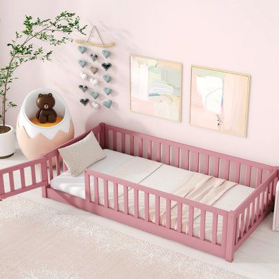 Transform your bedroom into a sanctuary of serenity with our elegant and practical beds that bring a touch of luxury to your daily routine. Treat yourself to the luxury you deserve with our bed, where every evening promises a peaceful and blissful slumber. Size: Twin, Color: Pink | Harriet Bee Twin Size Floor Bed w / Fence & Door, Platform Bed in Pink | 17.55 H x 78.25 W x 41.85 D in | Wayfair Twin Size Floor Bed, Floor Platform Bed, Twin Floor Bed, Kids Toddler Bed, Wood Playhouse, Playhouse Bed, Toddler Floor Bed, Floor Bed Frame, Montessori Bed