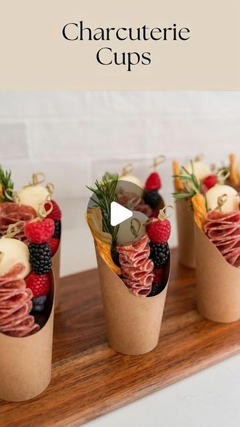 Elevate your next party with these easy charcuterie cups, a delightful twist on the traditional charcuterie board. Perfectly portioned for individual enjoyment, these cups are filled with a delicious assortment of meats, cheeses, fruits, and nuts, making them a hit at any gathering. Whether you're hosting a casual get-together or a more formal affair, these charcuterie cups add a touch of elegance and convenience. Impress your guests with this creative and tasty appetizer idea that's as fun to make as it is to eat. Charcuterie In A Cup, Baby Charcuterie Board, Creative Charcuterie Board Ideas, Easy Charcuterie Cups, Charcuterie Cups Ideas, Individual Charcuterie Board, Traditional Charcuterie Board, Charcuterie Skewers, Individual Charcuterie Cups