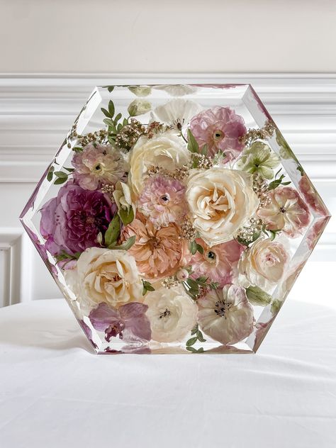 Preserve your flowers with us and remember your special day for years to come. A great way to display your flowers in your home!  Why Us? -over 3 years of experience -preserved and designed over 5000+ bouquets  -efficient & quick turnaround time with a quality piece, turnaround time for blocks is about 1-3 months from the day we receive your dried flowers -always available & no reservations required (although we do recommend to place an order as soon as possible to hold your spot and to also loc Preserved Bridal Bouquet Resin, Resin Bridal Bouquet, Resin Bouquet Wedding Flowers, Resin Wedding Bouquet, Bouquet In Resin, Bouquet Preservation Resin, Bridal Bouquet Preservation, Preserve Flowers, Flowers In Resin