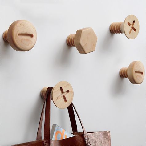 These Clever Wall Hooks Look Like Gigantic Screw Heads Into The Wood, Home Decor Hooks, Black Walnut Wood, Wall Key Holder, Screws And Bolts, Wooden Hangers, Into The Woods, Coat Hooks, Wooden Walls