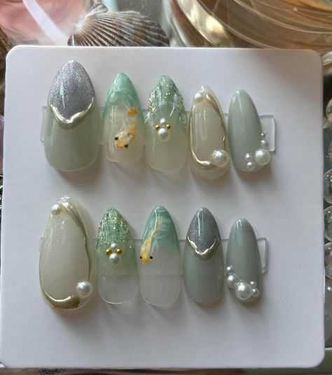 This Acrylic & Press On Nails item by EnchantedNailTips has 21 favorites from Etsy shoppers. Ships from Riverside, CA. Listed on Aug 4, 2024 Dark Beach Nails, Fish Themed Nails, Aquarium Nail Art, Jelly Fish Nails Art, Lily Pad Nails, Aesthetic Koi Fish, Alluring Makeup, Aesthetic Press On Nails, Koi Fish Nails