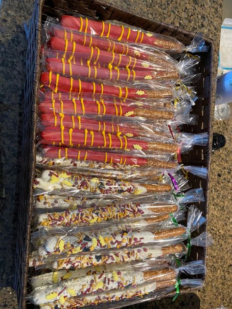 Red and yellow with lightning bolt, white chocolate with harry potter sprinkles Harry Potter Pretzel Rods, Chocolate Pretzel Rods, Harry Potter Theme Party, Pretzel Rods, Ribbon Garland, Chocolate Pretzels, Charcuterie Inspiration, Baby Gender Reveal Party, Harry Potter Theme