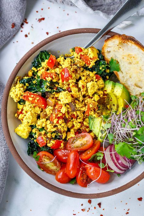 This Tofu Scramble recipe is so delicious! Load it up with seasonal veggies that you already have on hand, or keep it plain and simple- either way, you'll love this high-protein vegan breakfast. Make it in 15 minutes! Egg Muffins With Cottage Cheese, Muffins Breakfast Healthy, Muffins With Cottage Cheese, Cottage Cheese Egg Muffins, Best Tofu Scramble, Muffins Ideas, Tofu Scramble Recipe, Egg Muffins Breakfast Healthy, High Protein Vegan Breakfast