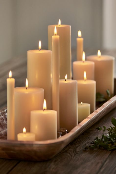 Create captivating atmospheres with Tag's pillar candles, setting the perfect scene in any space. With its versatile size, our signature flat-topped pillar candle is ideal for mixed candle displays or tall hurricanes, bringing warmth throughout the year. Explore a variety of candle sizes and colors from Tag, allowing you to mix and match for a personalized touch. Candle Cluster Decor, Candle Decor Ideas Living Rooms, Living Room Candle Decor, Candles On Tray, Long Candle Tray, Candles Display Ideas, Pillar Candles Decor, Candle Pillars Decor, Candle Scape