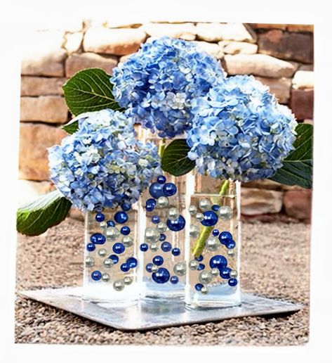 PRICES MAY VARY. Transform ordinary vases into EXTRAordinary centerpieces with these Eye-catching vase decorations. Great for wedding centerpieces, Hanukkah, mitzvahs, graduations, bridal showers, birthdays, gifts, and much more... Fills 4 gallons of 250 Floating Pearls and the most Transparent Gels for your vases! Contains:100 Blue Pearls and 80 Silver Pearls all with no holes and shiny, 16 Jumbo 30mm (1 1/4"), 32 Large 20mm (3/4"), and 132 medium (14mm/0.5") + 4 Packets of the most Transparent Vase Decorations, Floating Centerpieces, Denim And Diamonds, Blue Themed Wedding, Azul Real, Vase Fillers, Fairy String Lights, Floating Candles, Blue Pearl