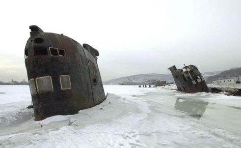 Abandoned Russian military submarines lay stuck in the ice where they sunk January 28, 2001 in Vladivostok, Russia. The country's military has suffered major budget cuts since the 1991 collapse of the Soviet Union. 🇷🇺 Vladivostok Russia, Abandoned Library, Scott Peterson, Abandoned Factory, Abandoned Church, Downing Street, Tourist Sites, Sparks Joy, Pacific Coast