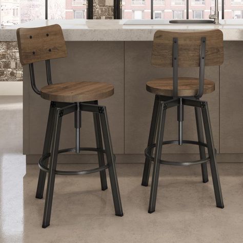 The Woodland stool brings the ultimate industrial look to your home with distressed materials, clean lines, and a minimalist aesthetic. No frills here. Just a harmonious contrast created from clean metal details that play up the warmth of aged wood. You’ll love the base with its open-ended screw and riveted plates. Amisco Woodland Light Brown Distressed Wood / Dark Grey Metal 24.5-in H Adjustable height Swivel Metal Bar Stool Back | 41269-WE/1B5187 Farmhouse Bar Stools, Rustic Cafe, Metal Bar Stool, Leather Kitchen, Bar Stools Kitchen Island, Industrial Stool, Industrial Bar Stools, Metal Stool, Welding Table