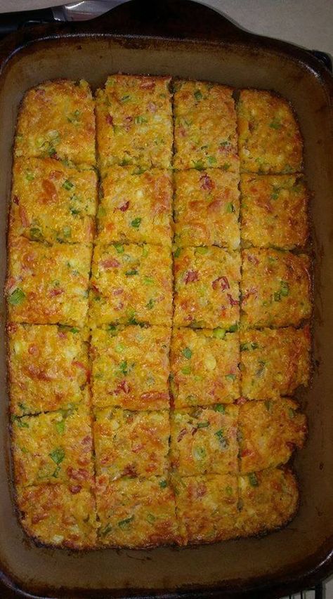 Crawfish Cornbread  1 box Jiffy (do not make according to directions on box!!!)  3 eggs  1 stick of butter, melted  1 cup chopped green onion  1 cup chopped white or yellow onion  1 can rotel tomatoes, drained  2 handfuls grated cheese of choice (I like Colby Jack or Pepper Jack)  1 lb crawfish tails (I coarsely chop mine)  Mix all ingredients. Pour into a greased 9x13 pan. Bake at 350 for 40-50 minutes. Crawfish Cornbread Dressing, Cajun Cornbread, Crawfish Dishes, Crawfish Cornbread, Crawfish Bread, Jiffy Recipes, Crawfish Recipes, Cajun Crawfish, Cajun Dishes