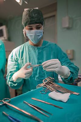 Portrait Of A Female Surgeon In The OR | Stocksy United Female Surgeon Aesthetic, Female Doctor Aesthetic Medical, Plastic Surgeon Aesthetic, Surgeon Female, Surgeon Aesthetic, Female Surgeon, Doctor Quotes Medical, Medical Life, Doctor Quotes