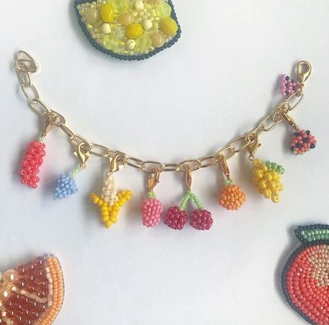 Hannah🌵 on Instagram: "Fruit salad charm bracelet 🥺🤩 available now in my shop (link in my bio) 🍇🍓🍌🍒🍊🍋 this is so cute I can’t cope 🥺🥰 all the charms can be clipped on or off so you can wear one at a time or all at once or however you fancy! The chain is 24k gold plated and it’s adjustable length. Swipe along to see my attempt at stop motion 🎥🎞 tag someone who would love this! 🥳🍓🍒🍊🍋🍇🍌✨ *also according to some sources on google chili peppers are considered to be fruits 😂* #ets Diy Gold, Fruit Jewelry, Zipper Charms, Gold Charm Bracelet, Chili Peppers, Bead Jewellery, Tag Someone Who, Tag Someone, Stop Motion