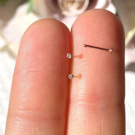 "TEENY TINY Rose Gold Nose Stud, 1mm Nose Stud, Tiny Nose Stud, Rose Gold Nose Stud, Tiny Diamond Nose Stud, Diamond Studs, Nose Jewelry Say 'Hello' to one of our best-selling items - the sparkly 18K Rose Gold plated \"AURORA\"! It's no wonder this 22g stud is popular  - these 18K Rose Gold plated nose studs are handmade and secured between a 4 prong setting with a 7mm post.  Discover your new favorite nose stud that will make you sparkle every day - the AURORA ✨ ⚡️ View All Nose Bones: https:// 1mm Nose Stud, Tiny Nose Ring, Rose Gold Nose Stud, Small Nose Studs, Tiny Nose Studs, Tiny Nose, Nose Ring Jewelry, Diamond Nose Ring, Nose Piercing Stud