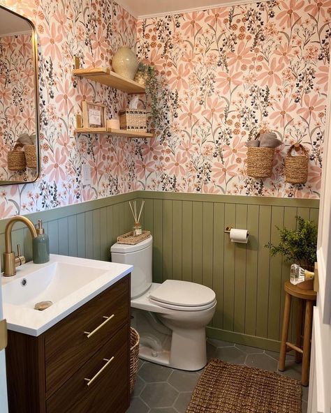 This powder room Bathroom included gld fixtures, a green batten wall, floral wallpaper, a floor hexagon tile and lots of wood elements. Green Batten Wall, Batten Wall With Wallpaper, Board And Batten Green, Green Board And Batten Wall, Wallpaper Board And Batten, Green Board And Batten, Wall With Wallpaper, Green Bathroom Colors, Powder Room Bathroom