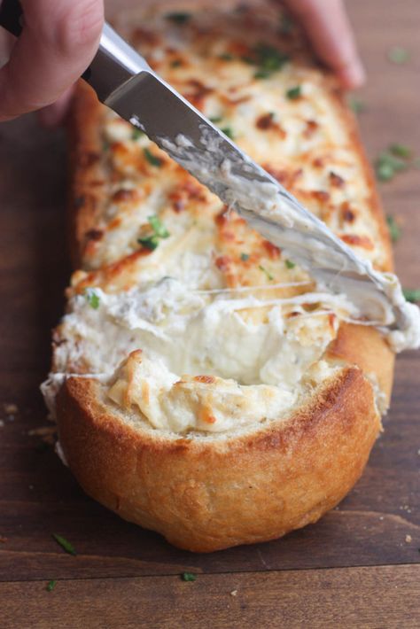 Artichoke Dip Stuffed Bread - our favorite hot artichoke dip recipe stuffed into a delicious crusty baguette. Makes a great, easy party appetizer!| Tastes Better From Scratch Popular Dips, Hot Artichoke Dip, Hot Snacks, Stuffed Bread, Halloween Food Appetizers, Artichoke Dip Recipe, Popular Appetizers, Fingerfood Party, Party Appetizers Easy