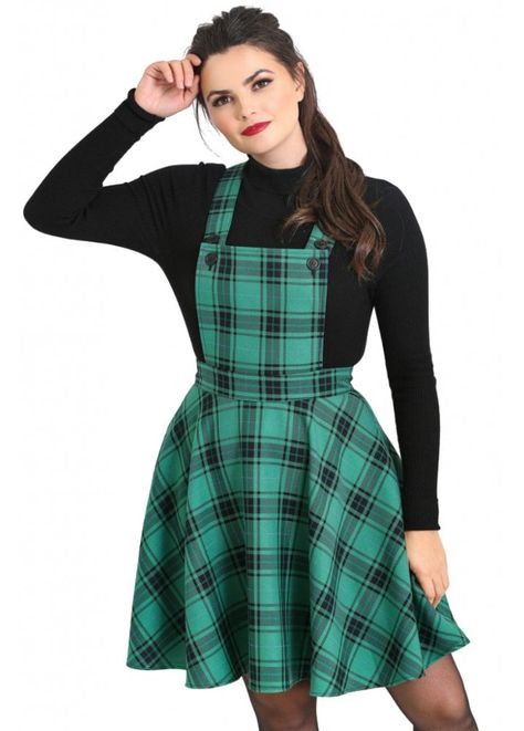 Hell Bunny's Brittany Pinafore Dress is a green and black tartan pinafore dress. This gorgeous green dress has a buttoned bib, a centre zip back and crossover straps.      Green and black tartan    Pinafore dress    Buttons on the bib    Adjustable crossover back    98% Polyester, 2% Viscose Alternative Dress, Attitude Clothing, Everyday Clothing, Gothic Dress, Pinafore Dress, Vintage Plaid, Winter Clothing, Button Dress, Dresses Uk