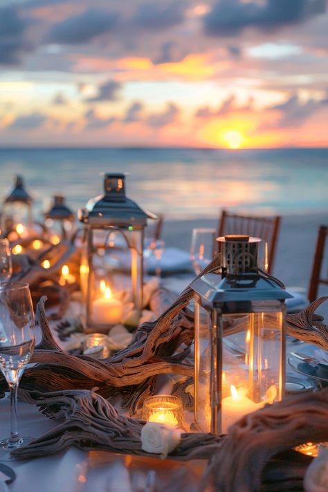 Capture the essence of love with these breathtaking wedding centerpieces. A blend of rustic driftwood and luminous lanterns create an unforgettable seaside ambiance 🌊🕯️. Perfect for brides dreaming of a beach-themed celebration 🏖️✨. #WeddingInspiration #BeachWedding #RomanticDecor #LanternCenterpieces #DriftwoodDecor #WeddingIdeas #Tablescapes #EveningGlow Nautical Centerpiece Ideas, Driftwood Wedding Centerpieces, Nautical Centerpiece, Driftwood Wedding, Nautical Candles, Driftwood Centerpiece, Candle Arrangements, Seaside Theme, Enchanting Wedding