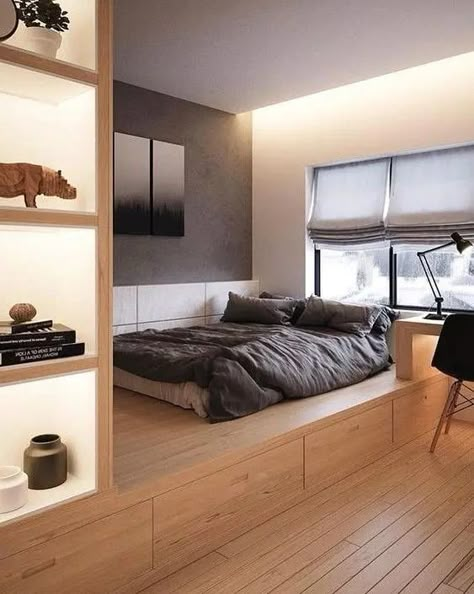 a contemporary bedroom with a platform bed with storage drawers, additional storage compartments on the left of the bed Small Sleeping Spaces, Small Bedroom Interior, Small Room Design Bedroom, Minimal Interior Design, Deco Studio, Appartement Design, Small Room Design, Modern Bedroom Design, Room Design Bedroom