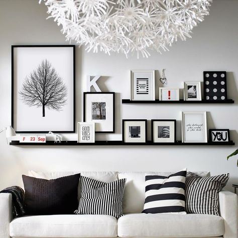 Wall Decor Large Living Room Wall Decor Ideas Modern, Black Picture Shelf, Black Picture Shelves, Long Picture Ledge Above Couch, Front Room Wall Decor Ideas, Photo Shelves Display, Picture Shelf Living Room, Over The Couch Wall Decor, Wall Art Shelf