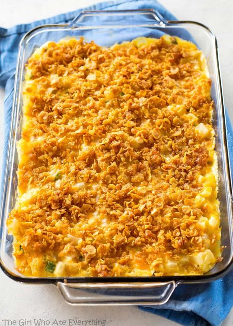 Funeral Potatoes - creamy, cheesy potatoes topped with buttery crunchy cornflakes. These are always a hit at get togethers. #funeral #potatoes #sides #dish #recipe #potluck Side Dishes For A Crowd, Dishes For A Crowd, Creamy Cheesy Potatoes, Ham And Potato Casserole, Party Potatoes, The Girl Who Ate Everything, Cheesy Ham, Hashbrown Casserole, Cubed Potatoes