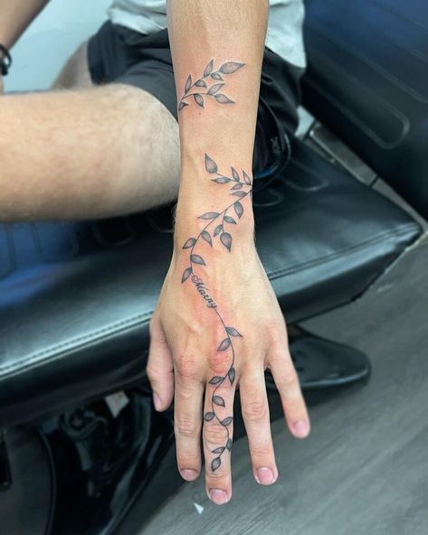 Mens Vines Tattoo, Cool Vine Tattoos, Vine Hand And Finger Tattoo, Tattoo Ivy Vine, Men’s Vine Tattoo, Flower Tattoo Ideas Men, Vine Tattoos Neck, Wrist Tattoos Men Cover Up, Wrist Wrap Tattoo Men