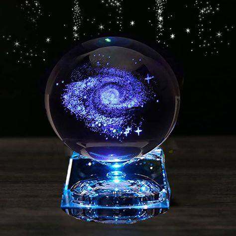 PRICES MAY VARY. This galaxy glass ball is made of premium crystal material,completely transparent and no bubbles,best decoration for any place,show an artistic and elegant style to your bedroom,living room and office Galaxy in glass Comes together with a crystal LED lighting Base(button cells included),emits uninterrupted bright light with multicolor changing alternately,makes this galaxy ornament to be a magical and pocket edition galaxy in the room Use advanced 3D Inner carving and flame extr Art Glass Ornaments, Crystal Drawing, Looking For Friends, Technology Gifts, Magic Gift, Gift For Anniversary, Blue Aesthetic Pastel, Glass Ball Ornaments, Gifts Teacher