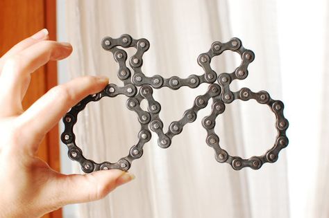 UpCYCLEd bike chain. Very cool ornaments and wall hangings made from bike chains.  All proceeds go to a family who is hosting an orphan this Christmas. Bike Sculpture, Bicycle Parts Art, Chain Sculpture, Bicycle Crafts, Bike Craft, Upcycled Bike, Bike Jewelry, Bicycle Chain, Bicycle Art