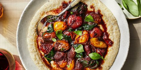 Creamy Polenta with Burst Cherry Tomato-and-Red Wine Ragout | Food & Wine Summer Tomato Recipe, Vegetarian Main Course, Creamy Polenta, Summer Tomato, Meatless Mondays, Cherry Tomato, Tomato Recipes, Vegetarian Meals, Meatless Meals