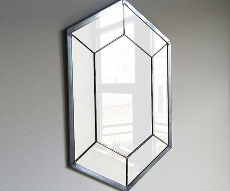 It's dangerous to go out of your home before giving yourself a quick once over. Place this Legend Of Zelda rupee mirror by the front door and you'll always have a convenient little place to check your appearance before you face the world.