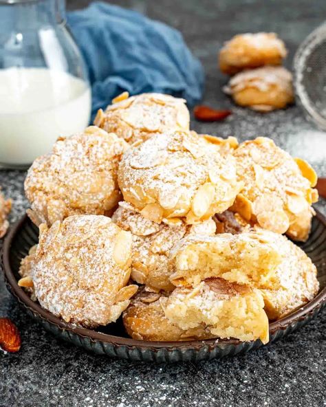 Try these delightful Italian Almond Cookies! Made with almond flour and topped with sliced almonds, they're gluten-free and perfect for any occasion. #ItalianAlmondCookies #GlutenFree #AlmondFlour #EasyRecipes #Baking #Cookies #Dessert Almond Crinkle Cookies, Almond Amaretti Cookies, Gluten Free Italian Desserts, Cookies Made With Almond Flour, Almond Flour Desserts, Gluten Free Almond Cookies, Almond Paste Cookies, Italian Almond Cookies, Cookie Recipes Decorating