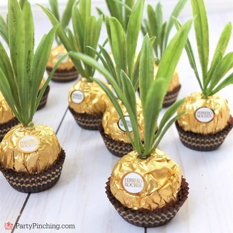 Ferrero Rocher Pineapples are so adorable and this DIY craft is so easy to make for a cute and fun party favor for a luau, beach, or pineapple party Pineapple Party Favors, Hawaii Themed Party, Pineapple Theme, Pineapple Birthday, Pineapple Party, Hawaiian Party Decorations, Wedding Favors And Gifts, Luau Theme Party, Hawaiian Luau Party