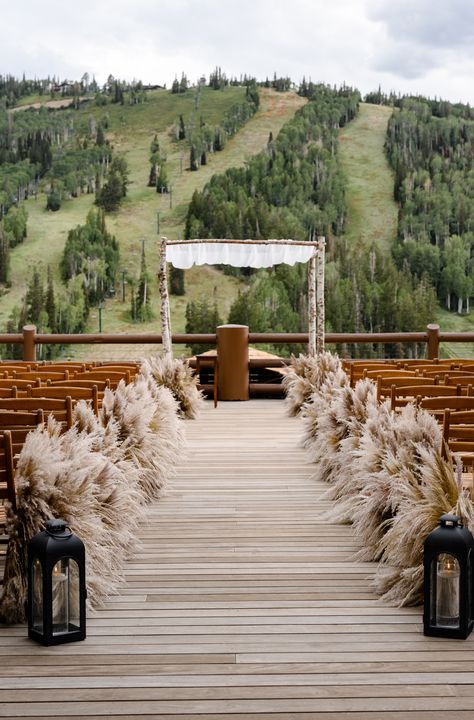 Pompus Grass Wedding Aisle, Pampas Grass Wedding Ceremony Aisle, Wedding Ceremony Pampas, Pampas Grass Wedding Aisle Decor, Blue And Pampas Grass Wedding, Wedding Arch Ideas Pampas, Rustic Wedding Decor Aisle, Pampas Grass Isle Wedding Decor, Pampas Ceremony Decor