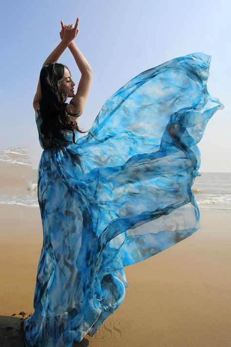 Wind Inspired Outfits, Blue Flowy Maxi Dress, Blue Flowy Dress, Bohemian Holiday, Holiday Maxi Dress, Beach Sundress, Orange Maxi Dress, Boho Dresses Long, Maxi Sundress