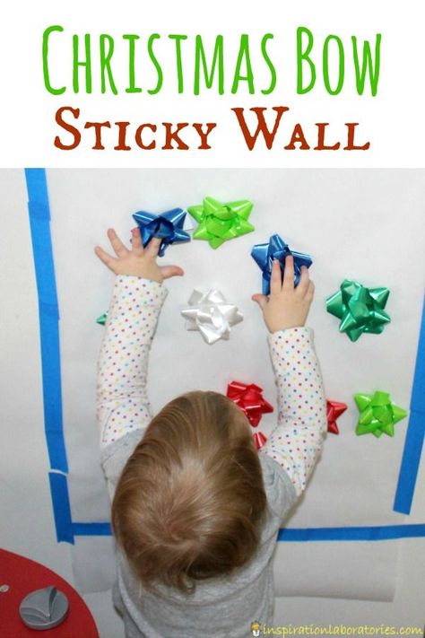 A Christmas bow sticky wall is the perfect activity for toddlers. Practice fine motor skills, colors, patterns, and keep them entertained! Crafts For Toddlers Christmas, Christmas Activities For Toddlers, Sticky Wall, Infant Classroom, December Activities, Activity For Toddlers, Christmas Crafts For Toddlers, Crafts For Toddlers, Daycare Activities