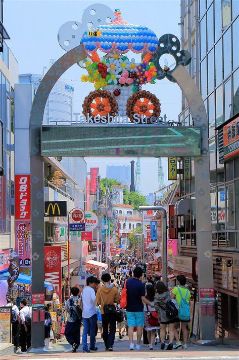 People walk down Takeshita shopping street in Harajuku, Tokyo Tokyo People, Tokyo Neighborhoods, Takeshita Street, Tokyo Shopping, Harajuku Tokyo, Harajuku Street, Shop Sign Design, Places To Shop, Neighborhood Guide