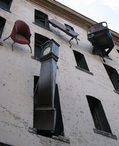 “Since 1997, the building known locally as “The House of Falling Furniture” located at the corner of 6th st. and Howard st. in San Francisco, has been a sculptural mural.The piece consists of sometimes malshapened tables, chairs, lamps and even a grandfather clock, all hanging precariously out of the building’s windows. Fall Furniture, San Francisco Houses, Portrait Sculpture, Art Installation, Sculpture Installation, Street Art Graffiti, Land Art, Public Art, Local Artists