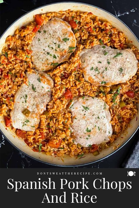 This Spanish Pork Chops and Rice recipe is creamy flavorful Spanish rice with ultra tender juicy pork chops! A one pan meal in about 30 minutes. Mexican Pork Chops And Rice, Spanish Style Pork Chops, Spanish Rice And Pork Chops, Pork Chops And Spanish Rice Recipe, Pork Chop And Rice, Spanish Pork Chops, Mexican Pork Chops, Barbecue Pork Chops, Spanish Pork