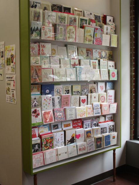 This case was suspended with little legs and filled with acrylic card holders to create this greeting card display at Chicago's Women & Children First. Postcard Display, Greeting Card Display, Acrylic Card, Card Displays, Card Display, Diy Valentines Crafts, Booth Display, Shop Front Design, Shop Window Displays