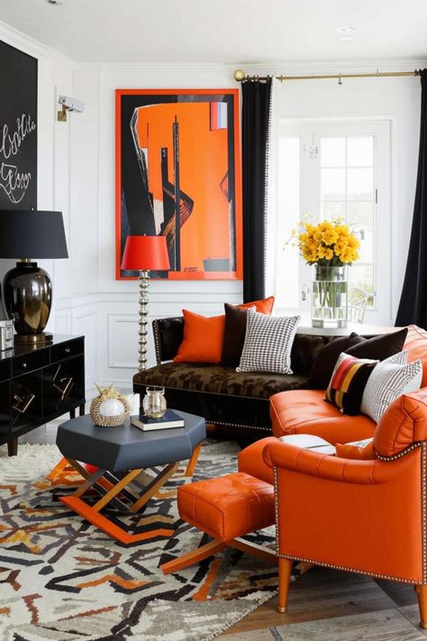 Elevate your living room with a bold black, white and orange color scheme. Discover inspiring ideas for modern furniture, statement art, and pops of color to create a chic and energetic space. Orange Black Living Room, Black And White Living Room Decor, Orange Color Schemes, Living Room Orange, Black Living Room, Statement Art, White And Orange, Decor Black, Bold Black