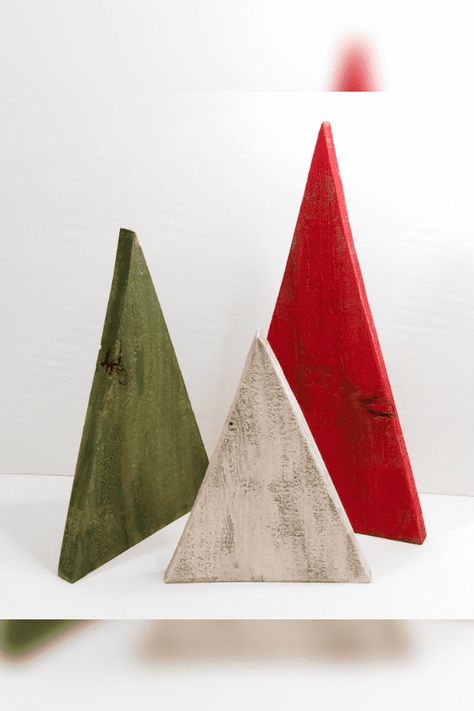 You will need three wooden triangles of various sizes to make these festive Trees. Triangle Christmas Tree Wooden, Wooden Triangle Christmas Trees, Triangle Wooden Christmas Trees, Wood Christmas Trees Diy Triangle, Wooden Triangle Christmas Tree Diy, Diy Small Wooden Christmas Tree, Triangle Wood Scraps, Wooden Triangle Gnomes, Christmas Tree Triangles