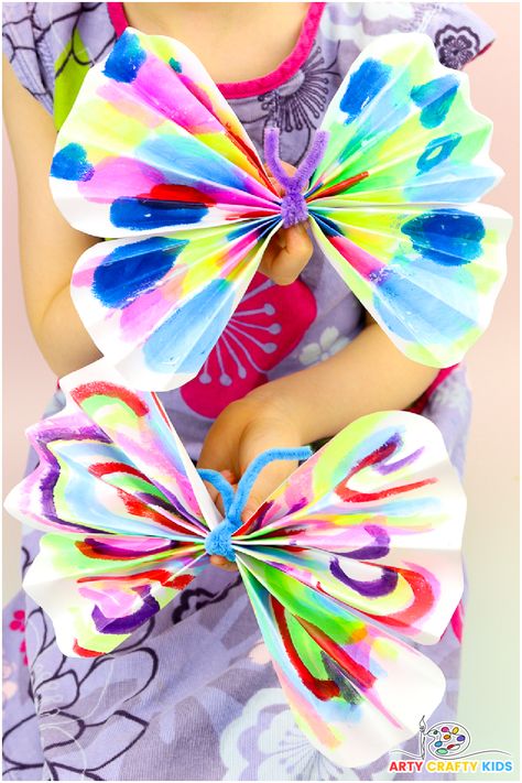 Transform your child's artwork into vibrant paper butterflies with this easy and fun craft! Perfect for preschoolers, this project uses simple accordion folds and a pipe cleaner to create beautiful butterflies. Great for recycling art and enhancing fine motor skills. Follow our step-by-step guide and explore more butterfly crafts at Arty Crafty Kids! 🦋 #KidCrafts #ButterflyCrafts #PreschoolActivities #RecycledArt #FineMotorSkills 3d Butterfly Craft Preschool, Tissue Paper Butterfly Craft, Pipe Cleaner Art For Kids, Butterfly Preschool Craft, Butterfly Crafts For Toddlers, Butterfly Art For Kids, Butterfly Kids Craft, Easy Butterfly Craft, Butterfly Art Project