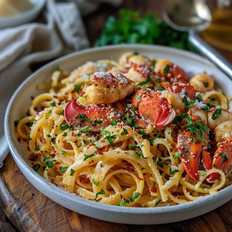 Lobster Linguine Ingredients: 500g linguine pasta 2 whole lobsters or 500g lobster meat (claws and tails) 4 tbsp unsalted butter 3 cloves garlic, minced 1 shallot, finely chopped 1/2 cup dry white wine 1 cup heavy cream Zest and juice of 1 lemon 1/2 cup grated Parmesan cheese Salt and pepper to taste 1/4 cup fresh parsley, chopped 1/4 tsp red pepper flakes (optional, for a bit of heat) #LobsterLinguine #SeafoodPasta #ItalianCuisine #GourmetPasta #HerbedFork #DeliciousDishes #EasyRecipes #Fan... Lobster Tagliatelle, Lobster Linguine, Gourmet Pasta, Linguine Recipes, Linguine Pasta, Lobster Meat, Shrimp Recipes Easy, Seafood Pasta, Dry White Wine