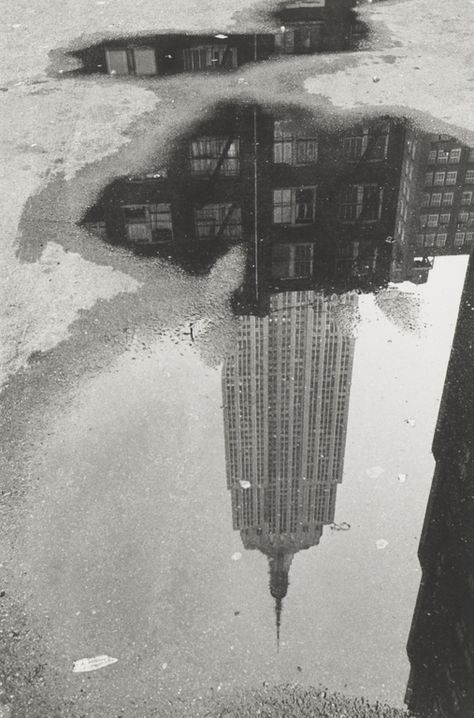 Puddle, New York; André Kertész (American, born Hungary, 1894 - 1985); New York, New York, United States; negative 1967; print 1970s; Gelatin silver print; 24.8 x 16.8 cm (9 3/4 x 6 5/8 in.); 84.XM.193.41; Copyright: © Estate of André Kertész Andre Kertesz, Photography Street, Getty Museum, Foto Vintage, Great Photographers, Grand Palais, Concrete Jungle, Ideas For, Urban Photography