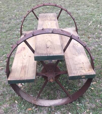 Metal Wagon Wheel Decor Outdoor Garden, Decorating With Wagon Wheels, Old Wagon Wheel Garden Ideas, Wagon Wheel Table Diy, Wagon Wheel Address Sign, Wagon Wheel Trellis, Old Wheels In Garden, Painted Wagon Wheel, Repurposed Wagon Wheels